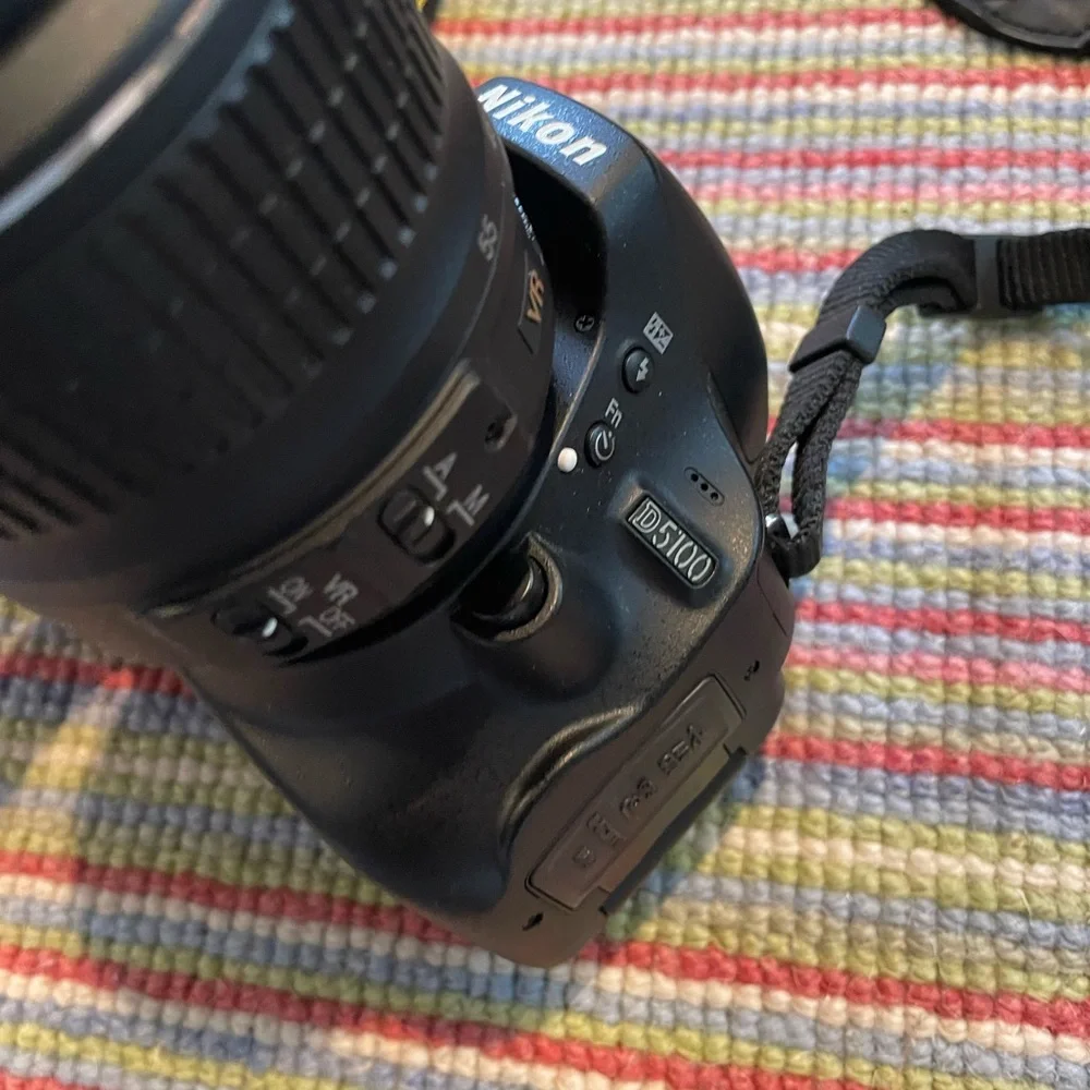 Nikon D5100 w/ standard AF-S Nikkor 18-55mm